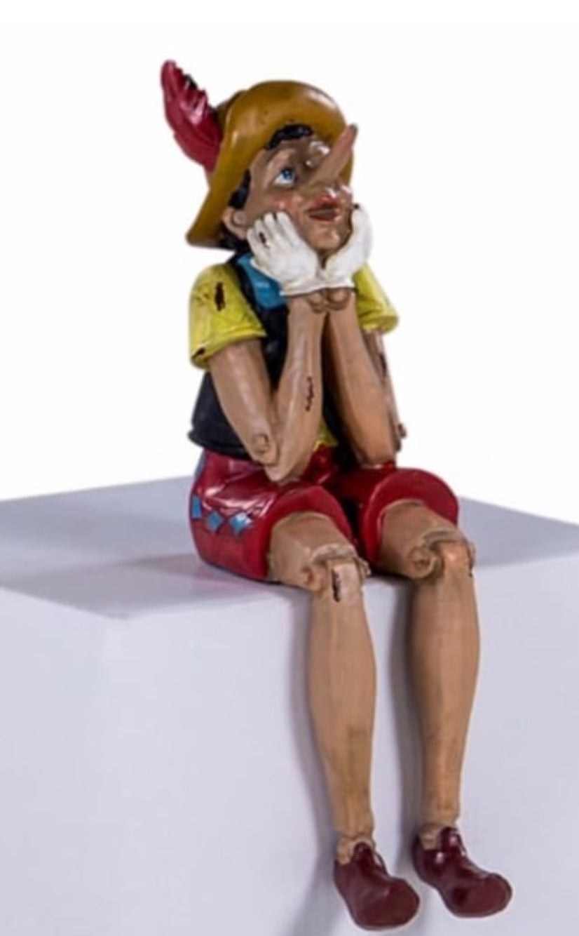 Antiqued Sitting Pinocchio figure