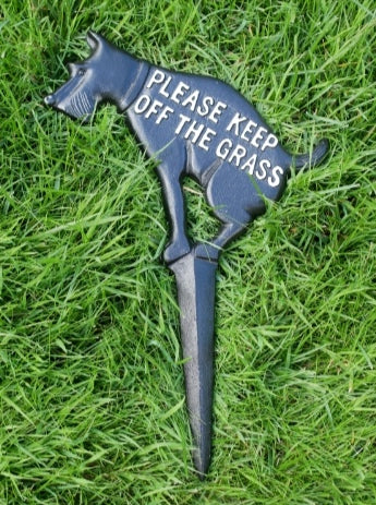 Please Keep Off The Grass Sign